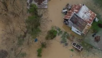 Integrating climate change induced flood risk into future population ...